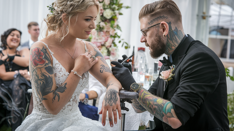 Bride and groom getting matching tattoos